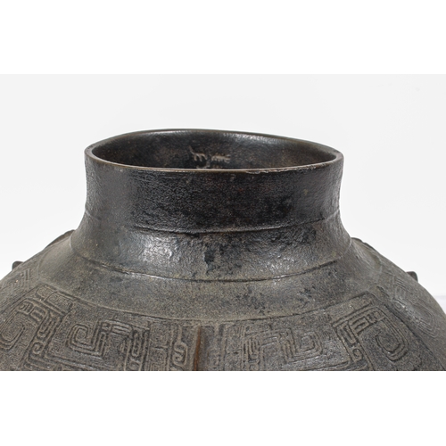 88 - A fine Chinese archaistic bronze ritual wine vessel, yuan lei, in the Yin period, late-Shang style -... 