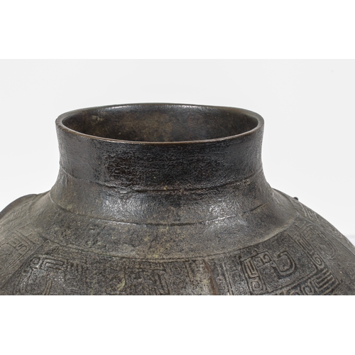 88 - A fine Chinese archaistic bronze ritual wine vessel, yuan lei, in the Yin period, late-Shang style -... 