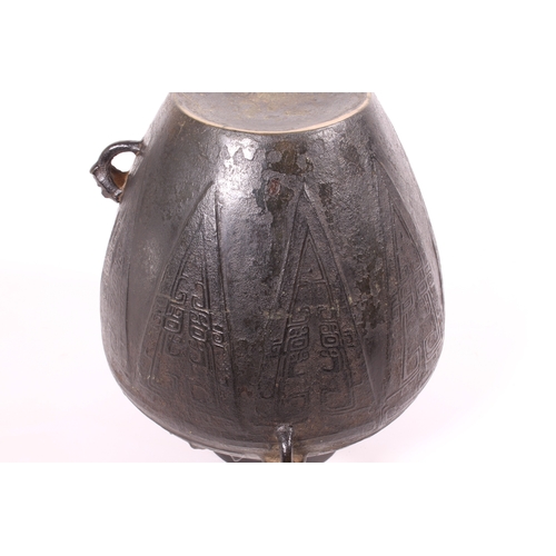 88 - A fine Chinese archaistic bronze ritual wine vessel, yuan lei, in the Yin period, late-Shang style -... 