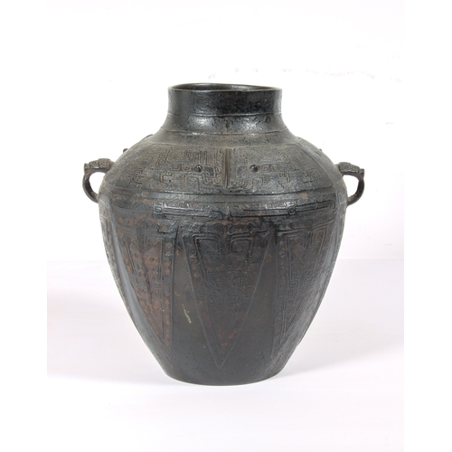 88 - A fine Chinese archaistic bronze ritual wine vessel, yuan lei, in the Yin period, late-Shang style -... 