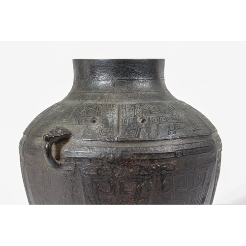 88 - A fine Chinese archaistic bronze ritual wine vessel, yuan lei, in the Yin period, late-Shang style -... 