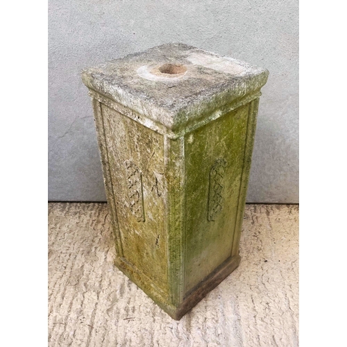 586 - A solid reconstituted stone garden plinth or pedestal - square panelled section, with outset moulded... 