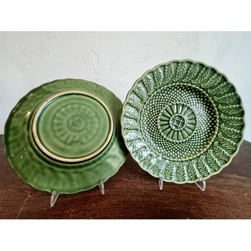 23 - A collection of 19th and 20th century majolica glazed leaf plates - some by Wedgwood, including eigh... 