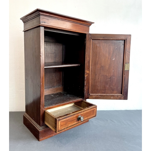 478 - An Edwardian small mahogany and satinwood banded tabletop cabinet - the flared ogee cornice over a s... 