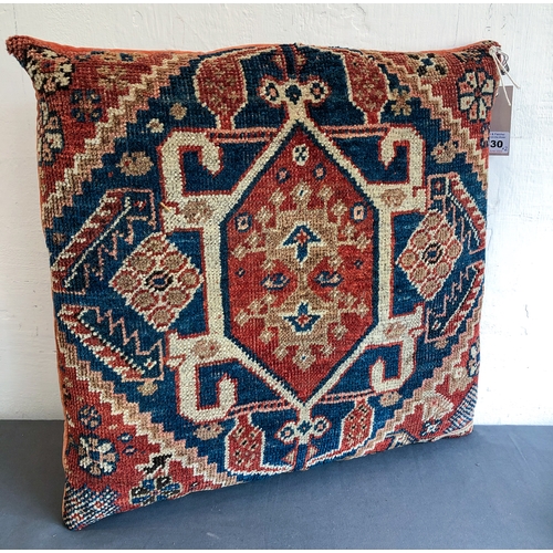 630 - Two Qashqai, South West Persian rug fragment cushions - the larger 57 x 40cm, the other 46 x 42cm.