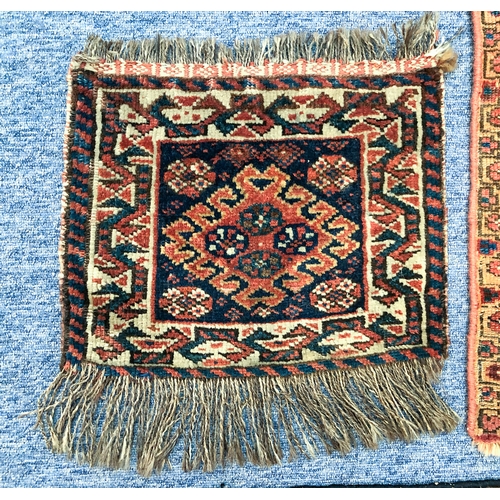 643 - Three hand knotted wool bag faces - the largest Kurdish, 52 x 47cm; one Afshar, 38 x 31cm; and one T... 