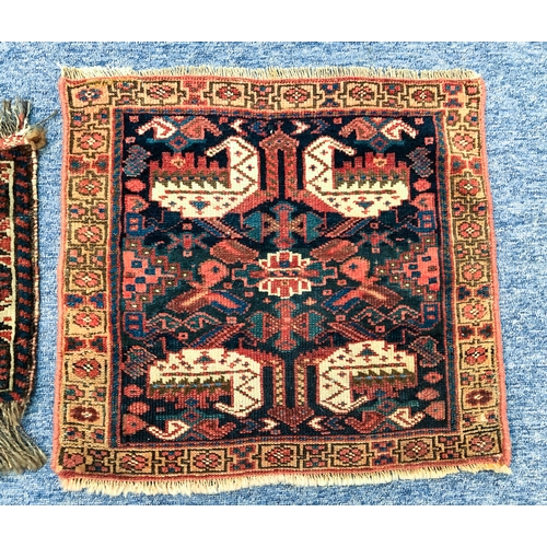 643 - Three hand knotted wool bag faces - the largest Kurdish, 52 x 47cm; one Afshar, 38 x 31cm; and one T... 