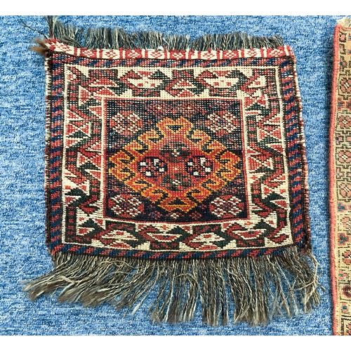 643 - Three hand knotted wool bag faces - the largest Kurdish, 52 x 47cm; one Afshar, 38 x 31cm; and one T... 