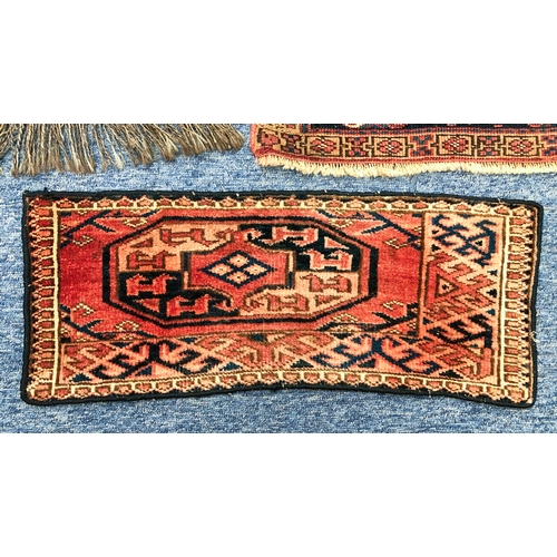 643 - Three hand knotted wool bag faces - the largest Kurdish, 52 x 47cm; one Afshar, 38 x 31cm; and one T... 