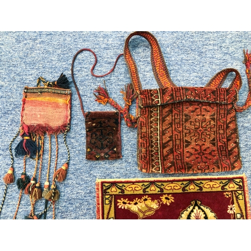 632 - Three Afghan hand-knotted wool bags - early to mid-20th century, together with a Belgian machine-mad... 