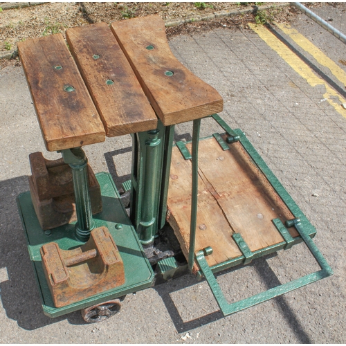 582 - A set of antique cast iron Avery outdoor agricultural scales - later green painted with two trolley ... 