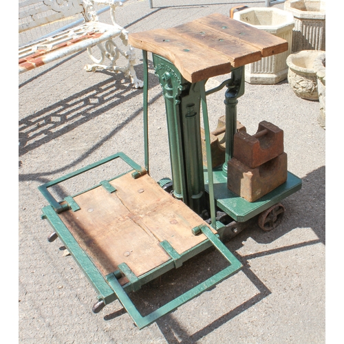 582 - A set of antique cast iron Avery outdoor agricultural scales - later green painted with two trolley ... 