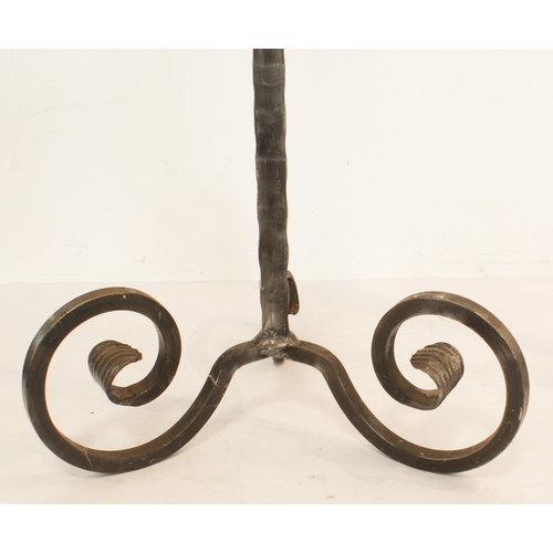 678 - A pair of wrought iron candle stands - modern, painted gunmetal, with part barleytwist and pierced s... 