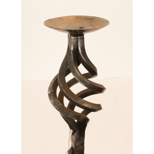 678 - A pair of wrought iron candle stands - modern, painted gunmetal, with part barleytwist and pierced s... 