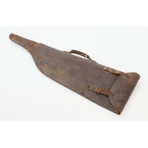 743 - An early 20th century leather shotgun 'leg of mutton' gun case - 78cm long.