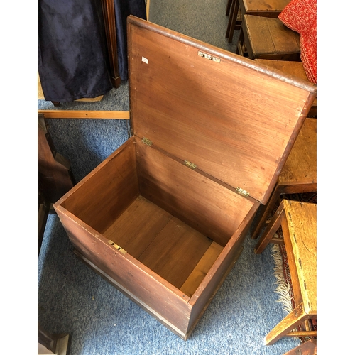 561 - A late 19th century cedar wood trunk - rectangular, with triple hinged lid and plinth base. (LWH 66 ... 