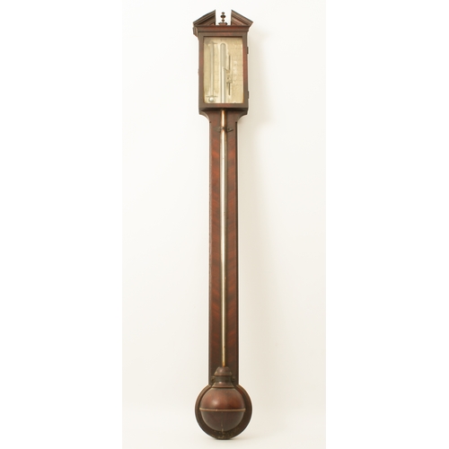 264 - A George III mahogany stick barometer by William Horrod of London - the broken architectural pedimen... 