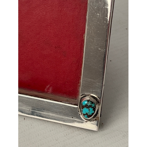 108 - A Liberty silver Arts & Crafts photograph frame set with two natural turquoise cabochon stones, oak ... 