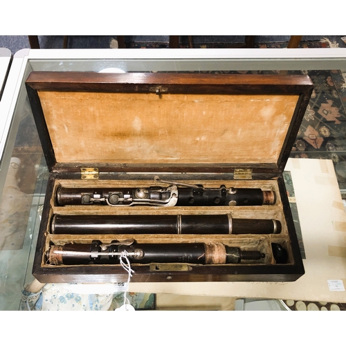 790 - A 19th century cocus wood and silver plated flute by Rudall & Rose - in a fitted rosewood case with ... 