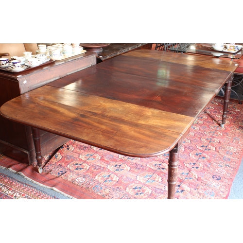 543 - A Regency mahogany dropflap extending dining table with concertina action - the rectangular dropflap... 