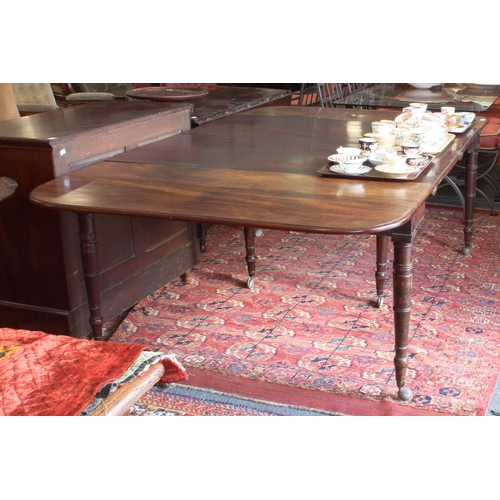 543 - A Regency mahogany dropflap extending dining table with concertina action - the rectangular dropflap... 