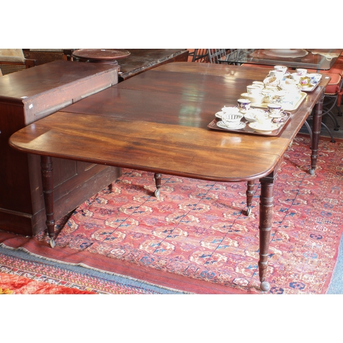 543 - A Regency mahogany dropflap extending dining table with concertina action - the rectangular dropflap... 