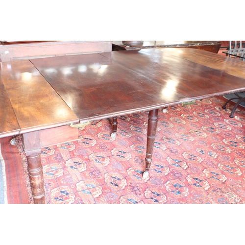 543 - A Regency mahogany dropflap extending dining table with concertina action - the rectangular dropflap... 