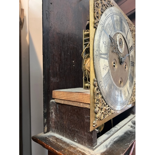 248 - A Queen Anne walnut and marquetry longcase clock - the square brass dial with twin cherub and crown ... 