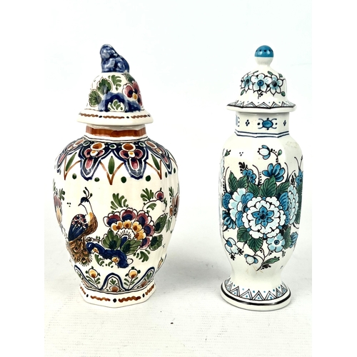 14 - Two Dutch Delft lidded baluster vases - 20th century, with polychrome floral decoration, the larger ... 