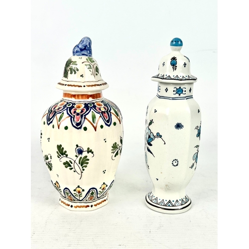 14 - Two Dutch Delft lidded baluster vases - 20th century, with polychrome floral decoration, the larger ... 