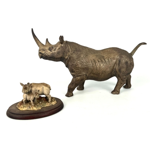 66 - Two figures of Rhinoceros by Coalport and Border Fine Arts - the Coalport bone china figure with bla... 