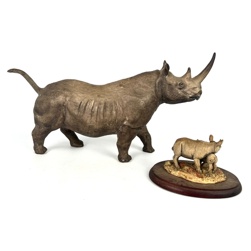 66 - Two figures of Rhinoceros by Coalport and Border Fine Arts - the Coalport bone china figure with bla... 