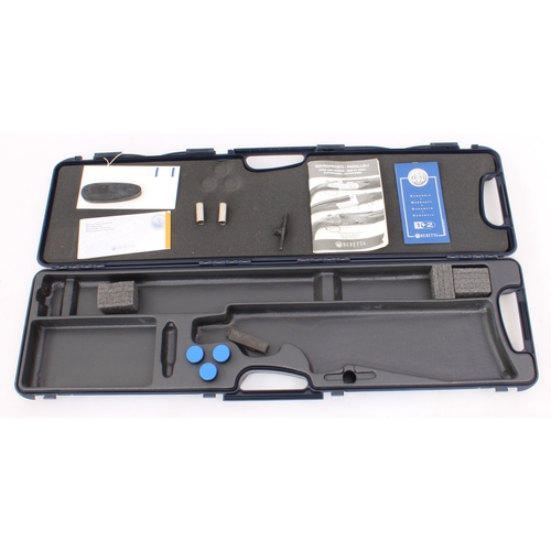 A Beretta over-and-under hard gun-case and its contents: three 20-bore ...