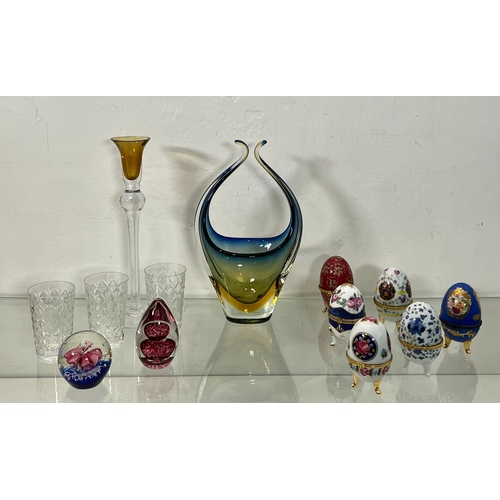 101 - A small collection of decorative glass and porcelain eggs - including a 1960s-70s Murano blue, yello... 