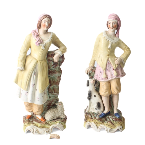 19 - A pair of mid-19th century Staffordshire figures of a shepherd and shepherdess – the shepherd with h... 