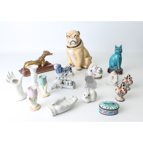 24 - A collection of pottery and porcelain figures of dogs and cats - 20th century, including a Chinese t... 