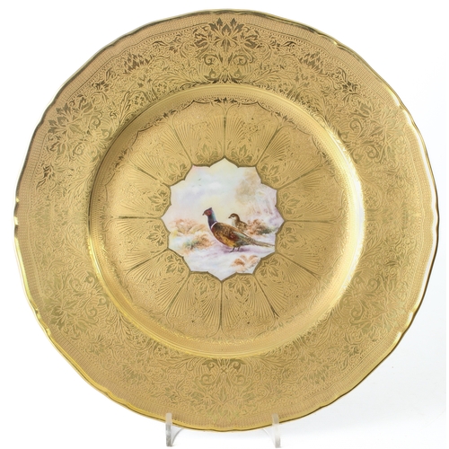 29 - A Royal Worcester gilt and hand painted pheasants cabinet plate - the shaped, circular plate with ri... 