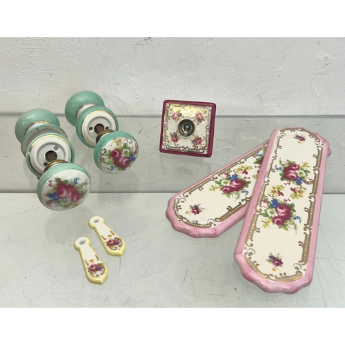 35 - A collection of vintage porcelain door knobs, finger plates and keyhole plates - early to mid-20th c... 