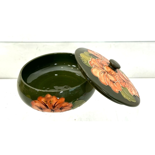 7 - A Moorcroft 'Coral Hibiscus' pattern powder bowl - on a green ground, impressed factory marks, 14.5 ... 