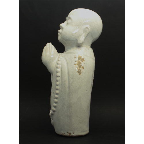 94 - A studio pottery style crackle glazed earthenware figure of Buddha - late 20th century, in an off-wh... 