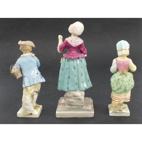 87 - A pair of Continental porcelain figures of a flower girl and boy - underglaze blue Berlin style mark... 