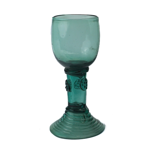 100 - A set of six Continental roemer style green wine glasses - probably 19th century, the ovoid bowls on... 