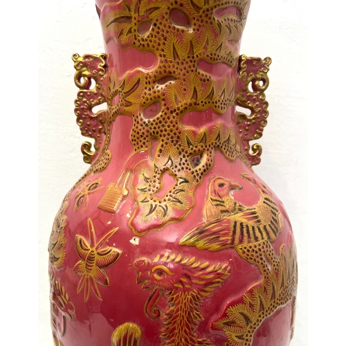 12 - A large 19th century English porcelain hall vase in the chinoiserie taste - baluster form, with ever... 