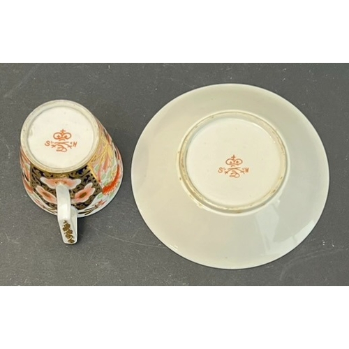 20 - Ten 19th century English porcelain tea cups and coffee cans in the Imari palette - each with its mat... 