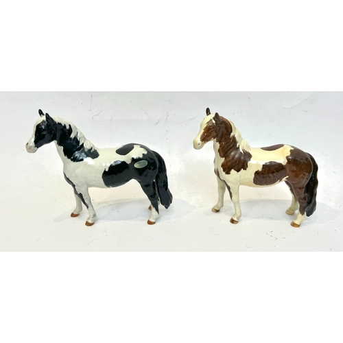 49 - Four Beswick horse figurines - comprising a 1644 dun Highland Pony; a 1549 Tucked Head Horse, chestn... 