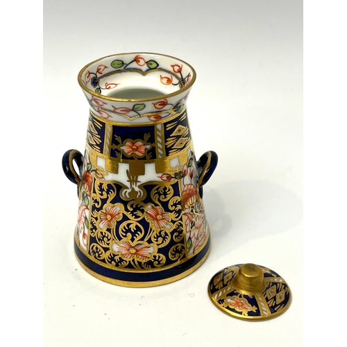 74 - Five pieces of English pottery and porcelain - comprising a Derby coffee can, painted with a river l... 