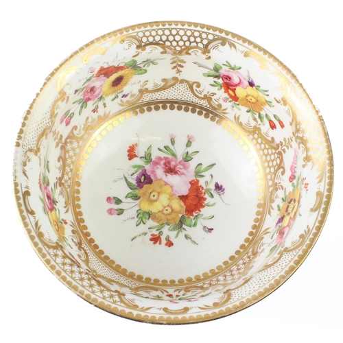 79 - An early-19th century Coalport porcelain bowl - painted with sprays of flowers within gilt cartouche... 