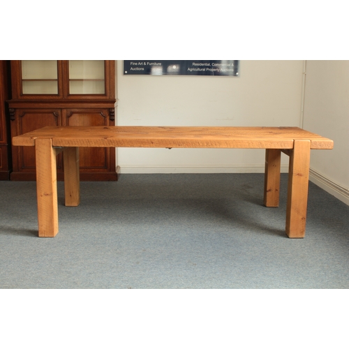 An Indigo of Matlock oak ‘Beam Table’ dining table with two matching