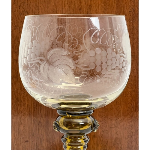 106 - A late-Georgian cut glass wine goblet - the drawn, ovoid bowl with comb cut and flower engraved band... 