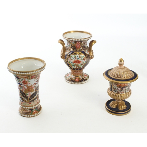 19 - A small collection of mid-19th century Imari decorated English porcelain - including a Spode two han... 